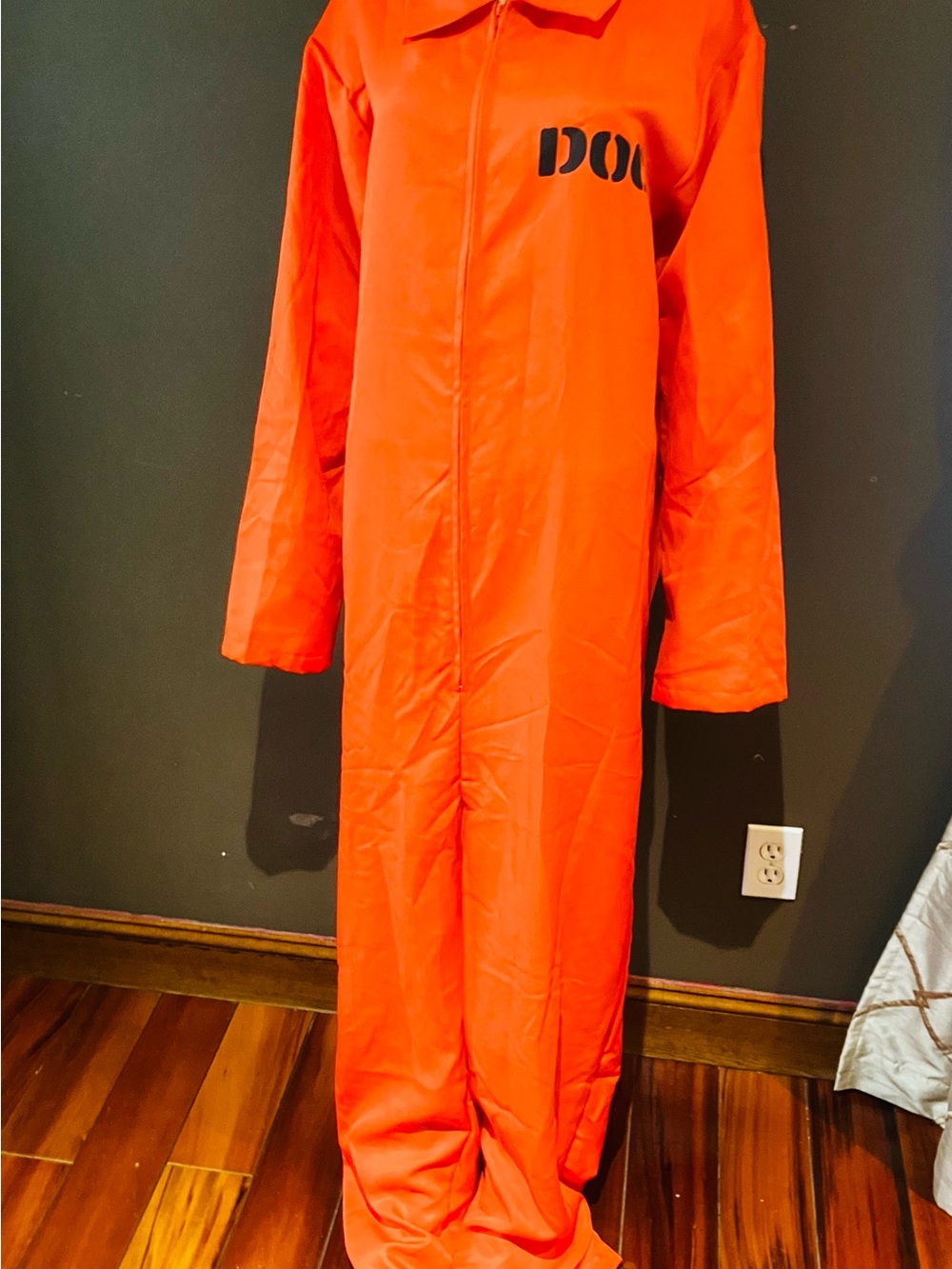 Spirit Halloween Orange Zip-Front Prisoner Costume.